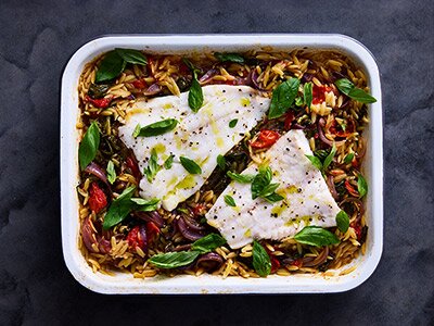 Baked Norwegian cod and cherry tomato orzo