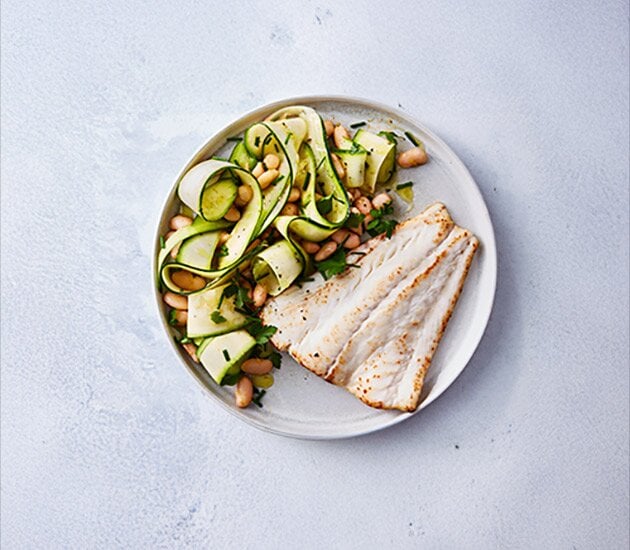 Pan-fried lemony Norwegian Haddock with warm white bean and courgette salad