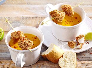 Curried squash soup with haddock and sesame skewers