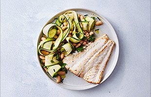 Pan-fried lemony Norwegian Haddock with warm white bean and courgette salad